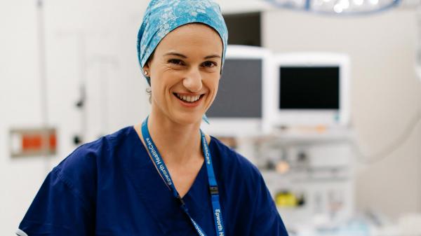 Nurse smiling in hospital setting